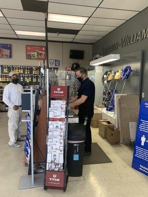 The manager and a customer at Sherwin Williams in Oxnard, California.