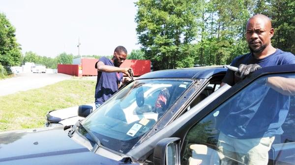 Malvin and greg replacing a windshield in Atlanta
