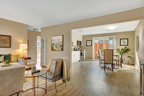 Living room and kitchen with lots of natural light