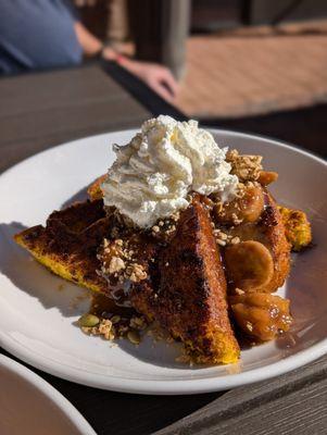 1/2 portion of bananas foster French toast