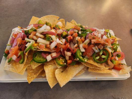 Happy hour loaded nachos