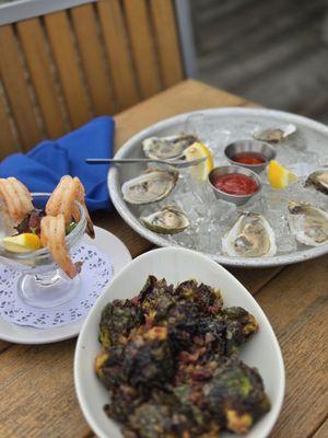 Charred brussels sprouts, shrimp cocktail, local oysters.
