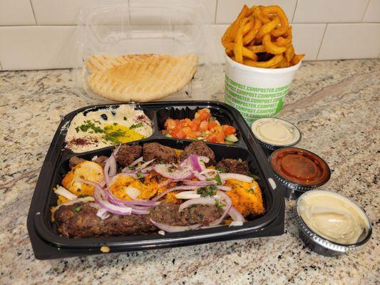 Mixed grill plate $18.99 & curly fries $3.99 with sauces (tahini, hot, garlic)