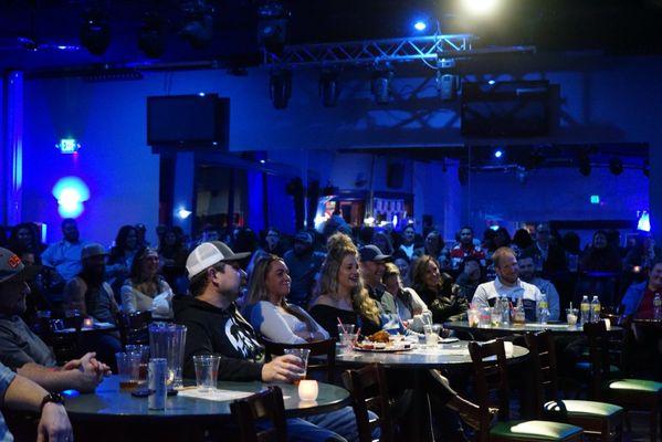 Audience enjoying comedian Jonathan Flanagan performing January 2023