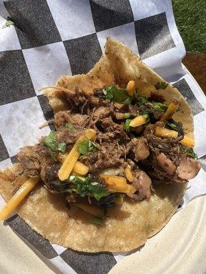 Spicy jerk jackfruit taco. It was so delicious I couldn't wait to take a pic before I took a bite .
