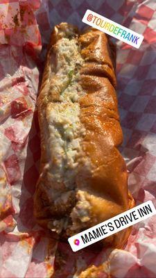 Chili, mustard, and slaw dog