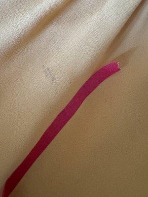 light mark on yellow dress