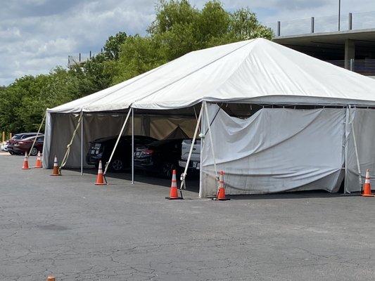 Covered work area where cars are repaired
