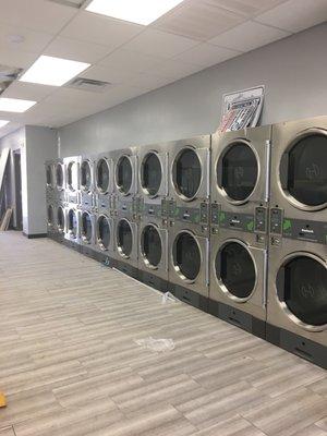 Row of brand new dryers!! Yeah baby!
