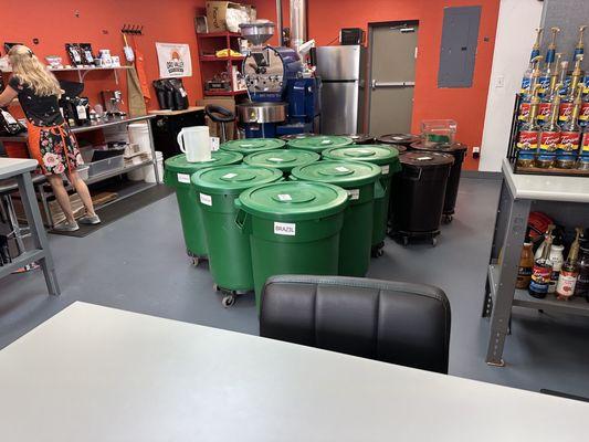 Green bins = raw beans, black bins = roasted beans