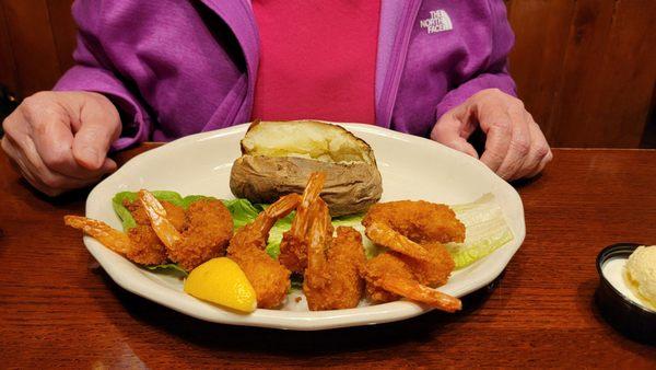 Shrimp dinner with baked potato