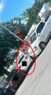 My car is the white one in the middle. The black car belongs to the tenant that I had to find.