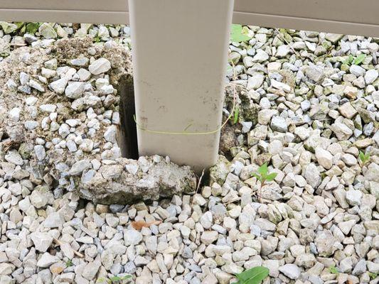 The post being uprooted from the ground