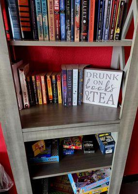 Adult book shelf area.