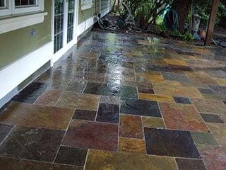 Wow! There really was a slate patio under all that dirt that showed up after the pressure washing.