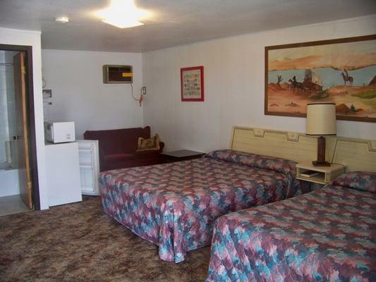We have rooms with one bed or two beds. We have a mini-fridge and microwave in each room.