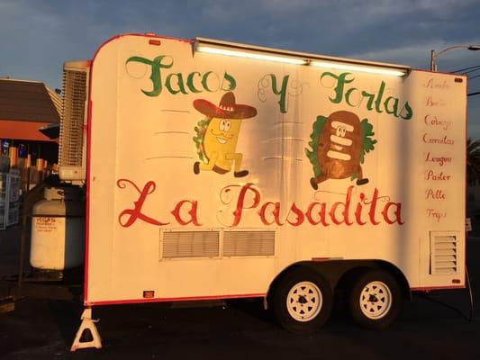 A sombrero-wearing taco chasing a torta