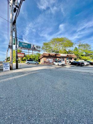 Exterior photo. Large parking lot, easy in and out.