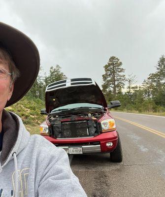 broken down on side of road in Bryce Canyon National Pk from 3p to midnight, started raining about 5p.