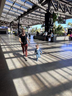 When my husband was waiting in line, my daughter and grandson ran around outside.