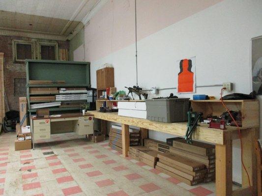 This is our work bench made by Clark Harrington where we receive inventory and get it ready for the show floor.