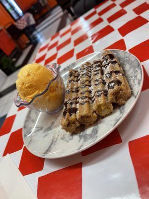 Churros with vanilla ice cream