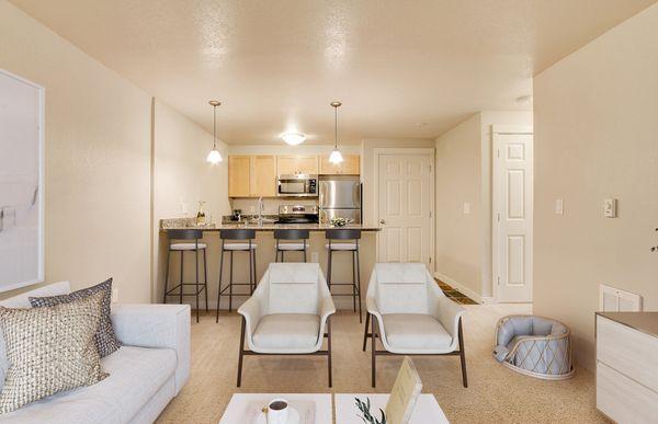 Staged living room and kitchen.