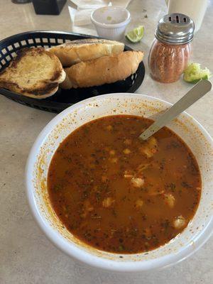 Menudo and toasted bread.