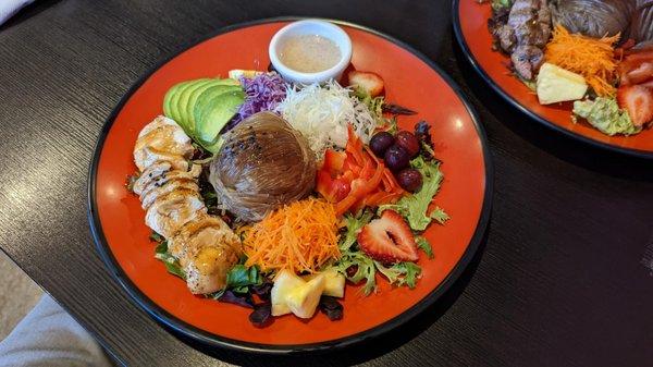 Teriyaki chicken lunch plate on salad with noodles and almond ginger dressing.  EXCELLENT!