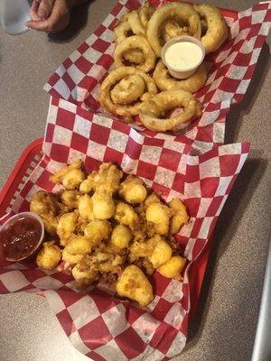 onion rings on top cheese curds on bottom