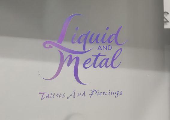 Liquid And Metal Tattoo And Piercings