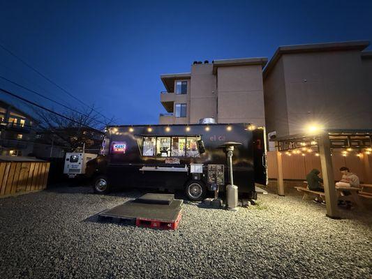 Sizable space for outdoor dining and parking.