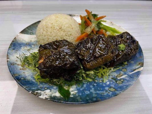 Salmon with grape leaves