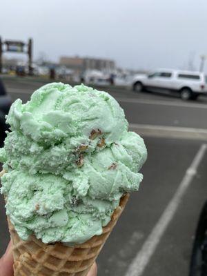 Pistachio Ice Cream on a waffle cone