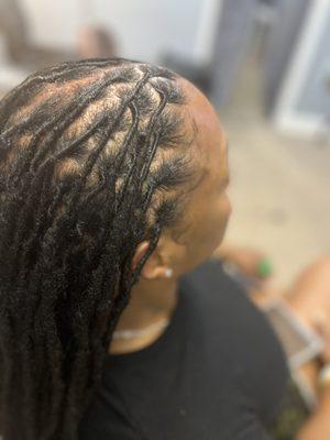 Dreadlocks retwist