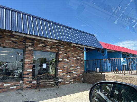 Car wash next-door. They also have front parking for handicap and some benches outside. It's pretty nice and convenient.