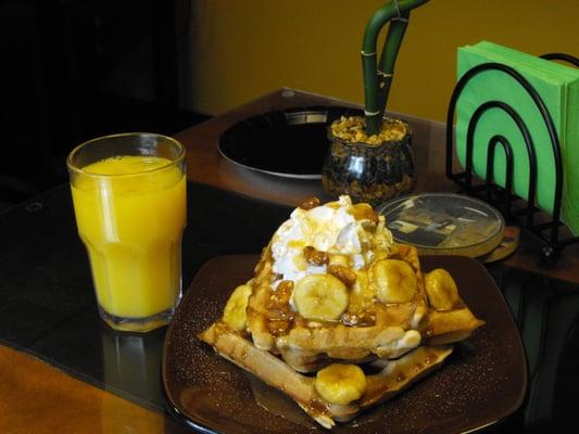 This is our yummy banana fosters dessert waffle,now serving our new cheetahs going banana's ..a tasty pastry ,w/Carmel & pecans