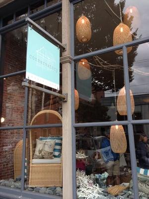 The outside of Conservatory Coastal Home. Want those lamps!