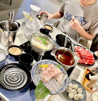 Pork bone + spicy sukiyaki broths w boneless short ribs, sliced basa fish shabu, masago fish balls add on