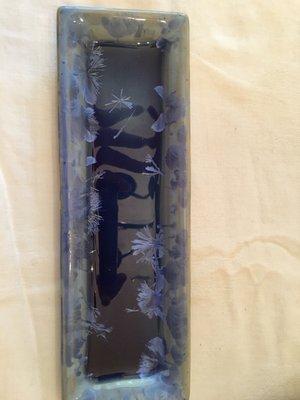 Nice, dark blue reflective tray with crystalline glaze features