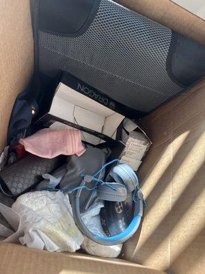 Random item box that was returned with soot and insulation inside