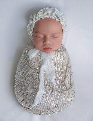 Newborn baby girl decked out for the holidays!