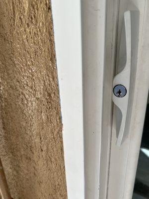 Outside sliding door handle with exterior lock.