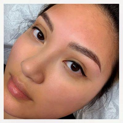 Nano hairstrokes and eyeliner tattoos