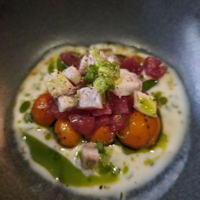 The roasted tomatoes covered taste of raw tuna and smoked eel