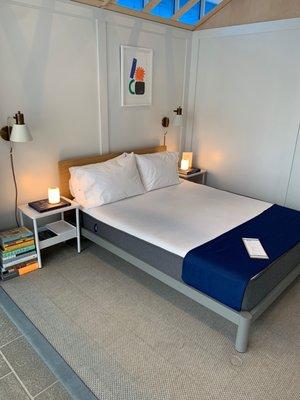 Queen Casper displayed on Casper Platform in Gray. New product, Glow, featured on nightstands.