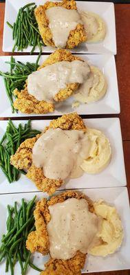 Hand cut and hand breaded chicken fried steak dinner