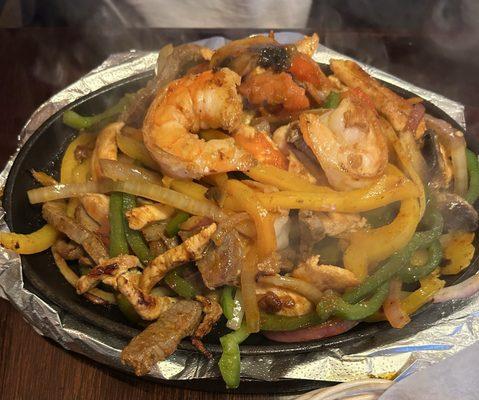 Steak, chicken, and shrimp fajita. Shrimp tastes high quality.