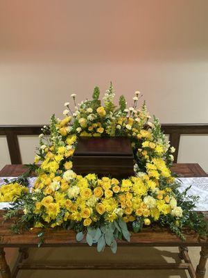 Shellie helped us create the perfect arrangement to go around my mother's urn.