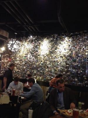 10,000 belt buckles on the wall.